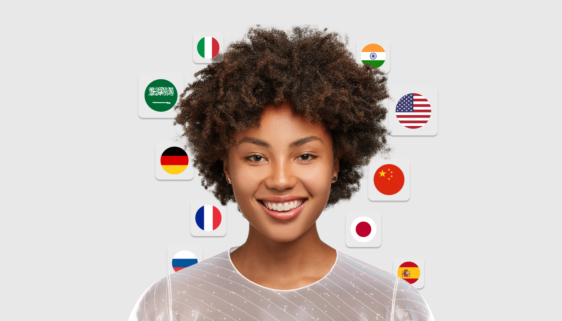 Smiling woman stands in front of a gray background with various international flags, representing the global reach possible through automatic video translation and AI video voice translator technology.