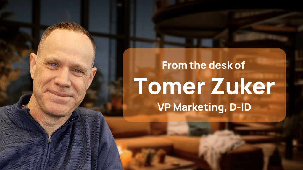 A man in a blue sweater sits in front of a blurred library background; text reads "From the desk of Tomer Zuker, VP Marketing, D-ID—Adopting Generative AI: Enterprises and Small Businesses.