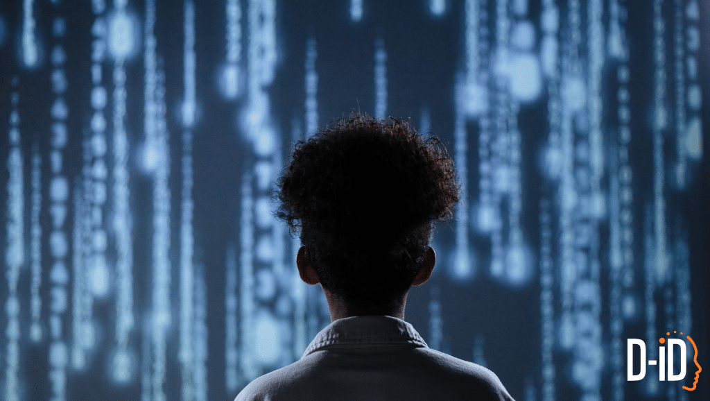 A person with short curly hair viewed from behind looks at a digital screen displaying vertical lines of code or data, representing an AI Presenter; a D-ID logo is in the bottom right corner.